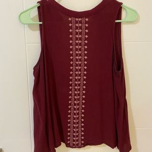 Red sleeveless blouse